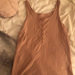 A new day button tank